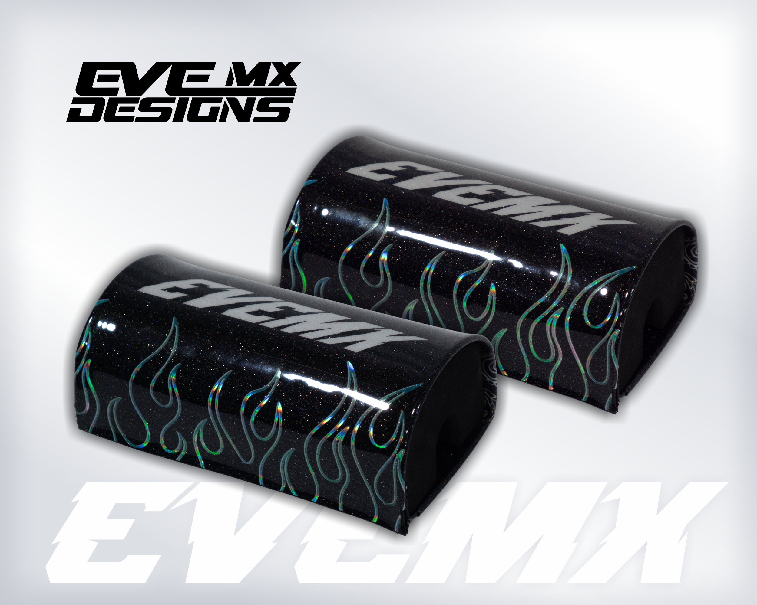 Two black cylindrical covers with green flames and 'EVE MX' branding on a white background.