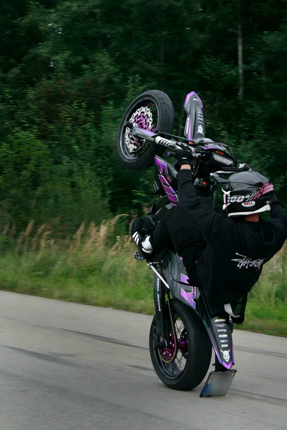 EVEMX rider doing a wheelie